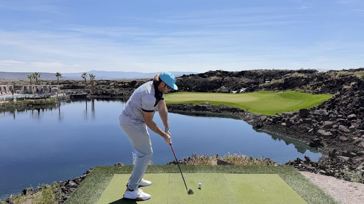 Josh Zieglowsky mid-swing on the course
