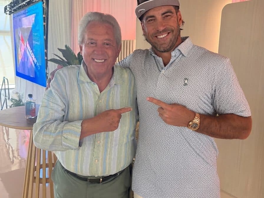 Josh Zieglowsky with John Maxwell at an event
